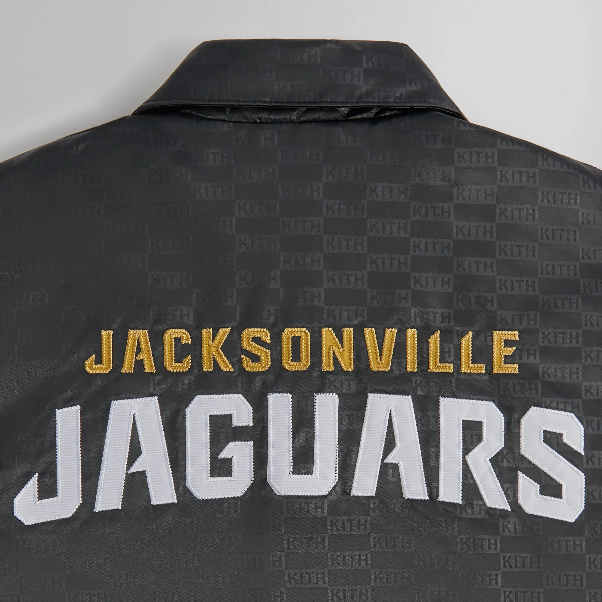 Kith for the NFL: Jaguars Satin Bomber Jacket - Black sold by Kith product image thumbnail 4
