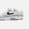 Nike Air Max 1 - Platinum Tint / Wolf Grey / Dark Obsidian sold by Kith