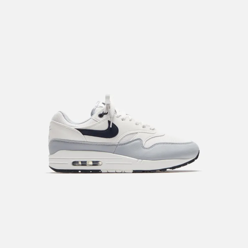Nike Air Max 1 - Platinum Tint / Wolf Grey / Dark Obsidian sold by Kith