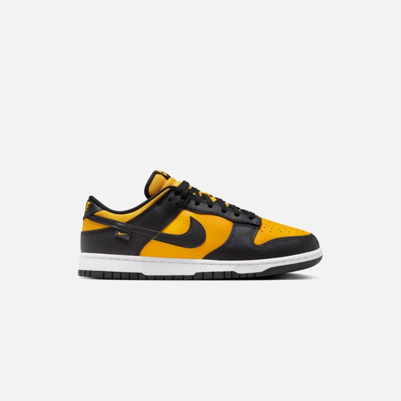 Nike Dunk Low - Black / University Gold / White sold by Kith