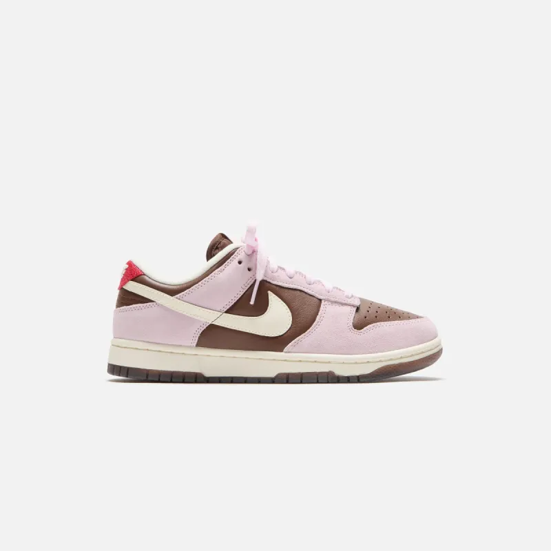 Nike WMNS Dunk Low - Cacao Wow / Pale Ivory / Pink Foam sold by Kith