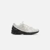 CDG Homme x New Balance 1906 - White / Black sold by Kith