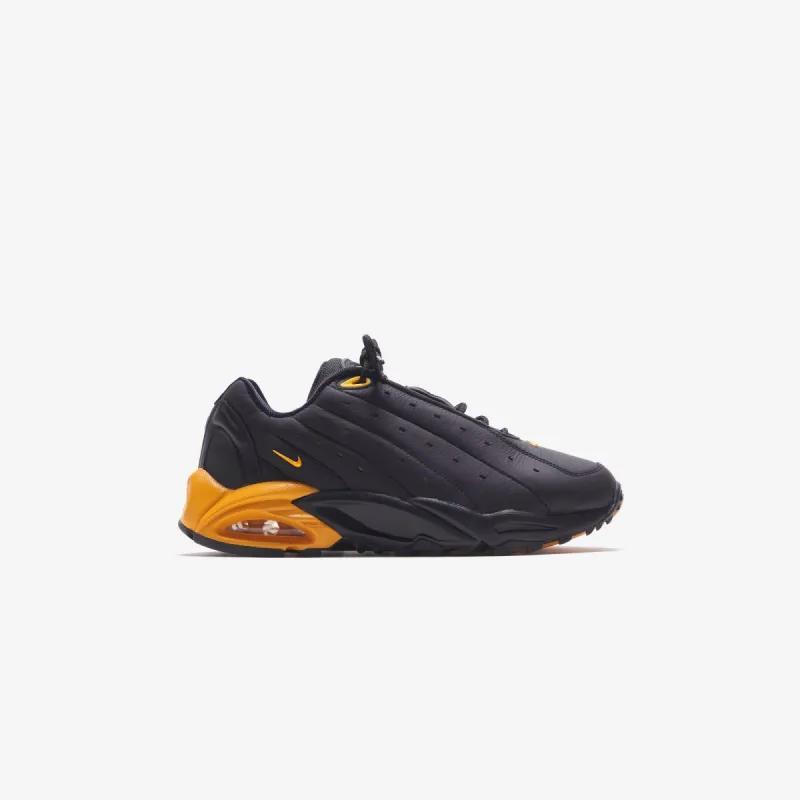 Nike x NOCTA Hot Step Terra - Black / University Gold sold by Kith
