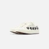 Comme Des Garçons Play x Converse Multi Heart Low Top - Beige / Black sold by Kith