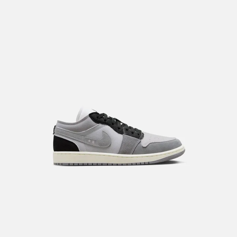 Nike Air Jordan 1 Low SE Craft - Tech Grey / Black Cement sold by Kith