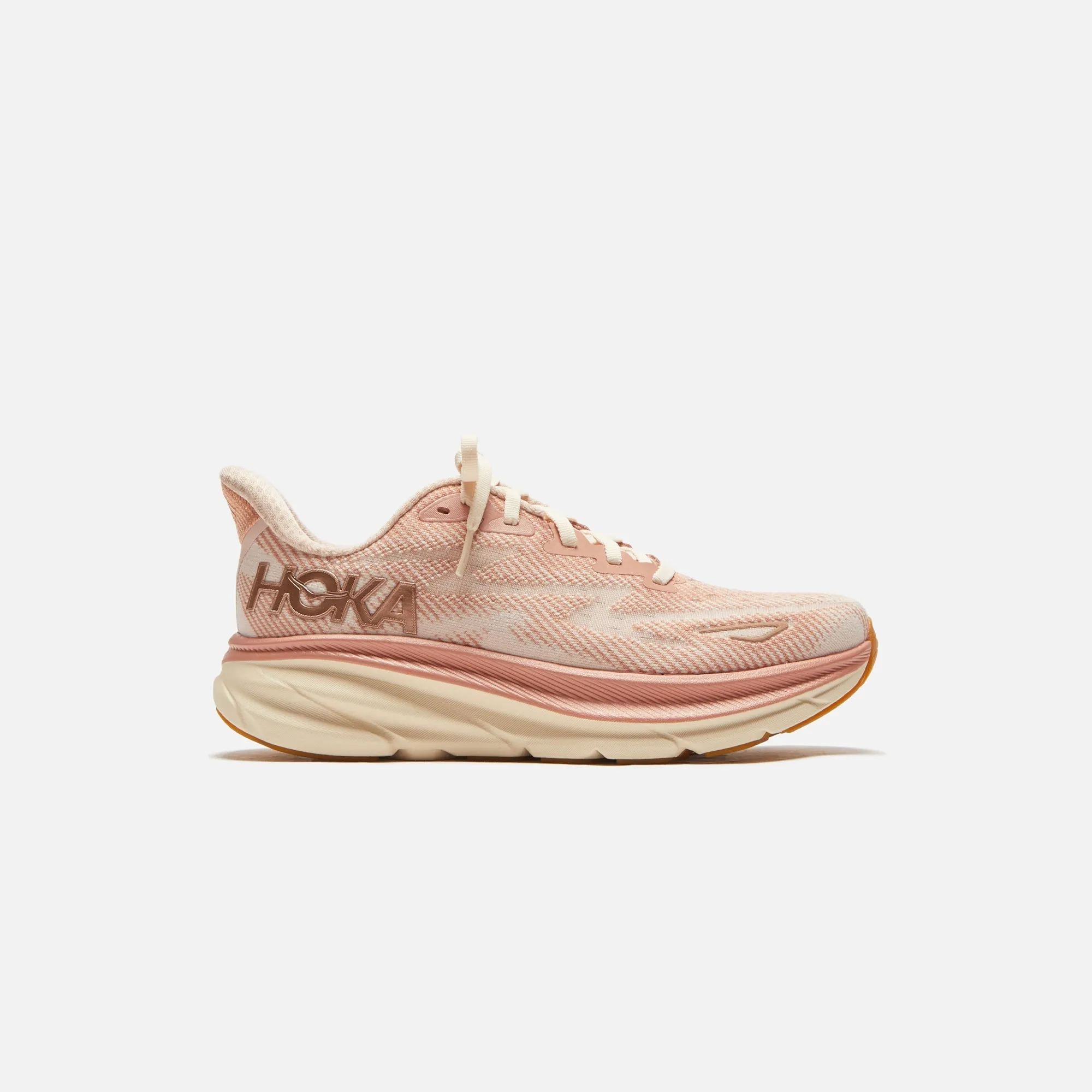 HOKA WMNS Clifton 9 - Sandstone / Cream sold by Kith
