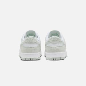 Nike WMNS Dunk Low - White / Light Silver sold by Kith