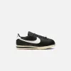 Nike WMNS Cortez 23 - Black / Alabaster / Sail sold by Kith