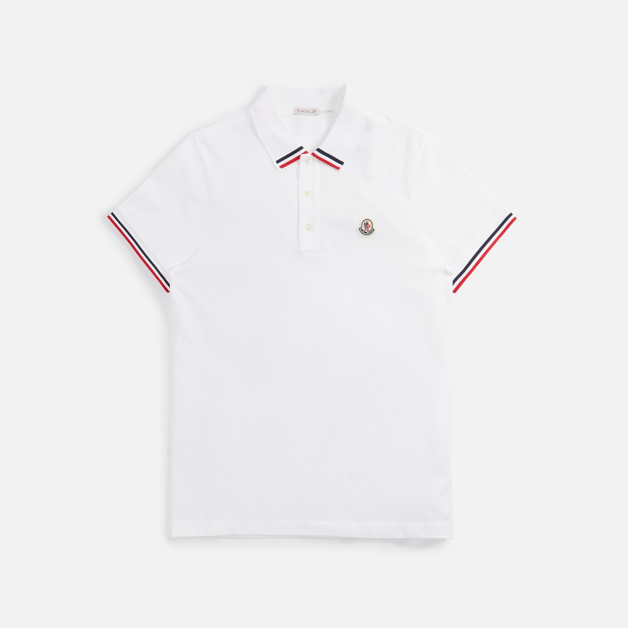 Moncler Polo - White sold by Kith
