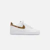 Nike Air Force 1 Low - White / Elemental Gold / Dark Haze sold by Kith
