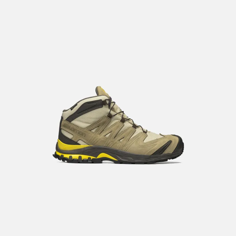 Salomon x BGS XA Pro 3D Mid GTX - Safari / Kelp / Empire Yellow sold by Kith