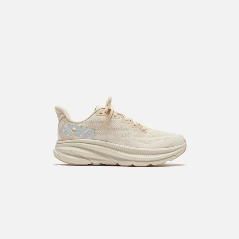 HOKA WMNS Clifton 9 - Shifting Sand / Eggnog sold by Kith