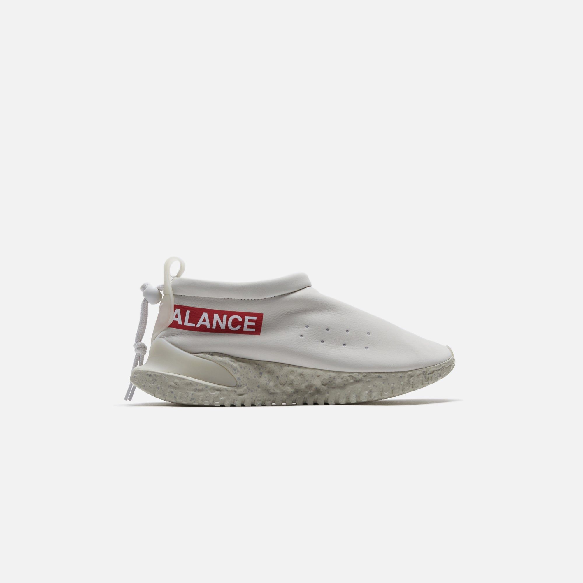 Nike x Undercover Moc Flow SP - Light Bone / University Red / White sold by Kith