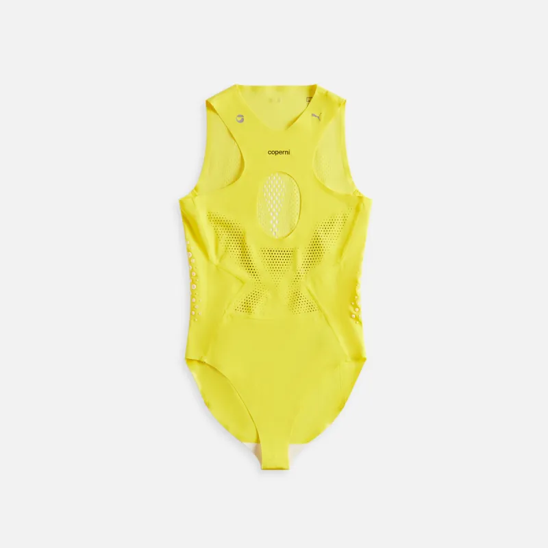 PUMA x Coperni Bodysuit - Yellow sold by Kith