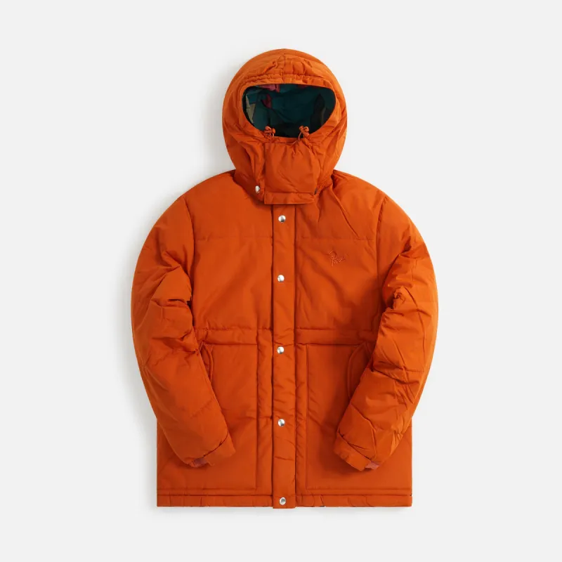 by Parra Trees In Wind Puffer Jacket - Sienna Orange sold by Kith