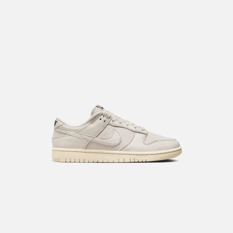 Nike Dunk Low Retro PRM - Light Orewood Brown / Sequoia / Guava Ice sold by Kith