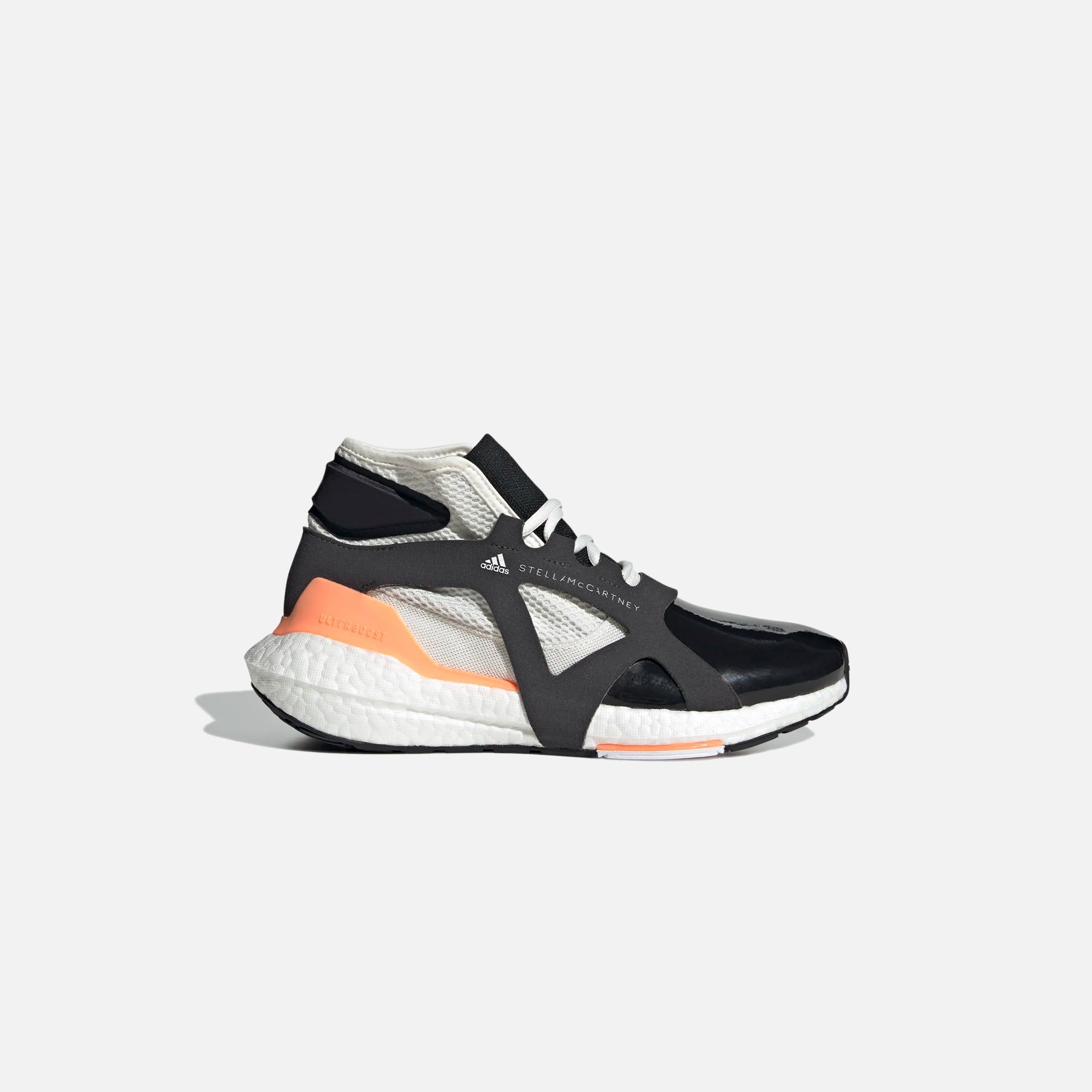 adidas by Stella McCartney UltraBoost 21 - Core Black / Footwear White / Beam Orange sold by Kith