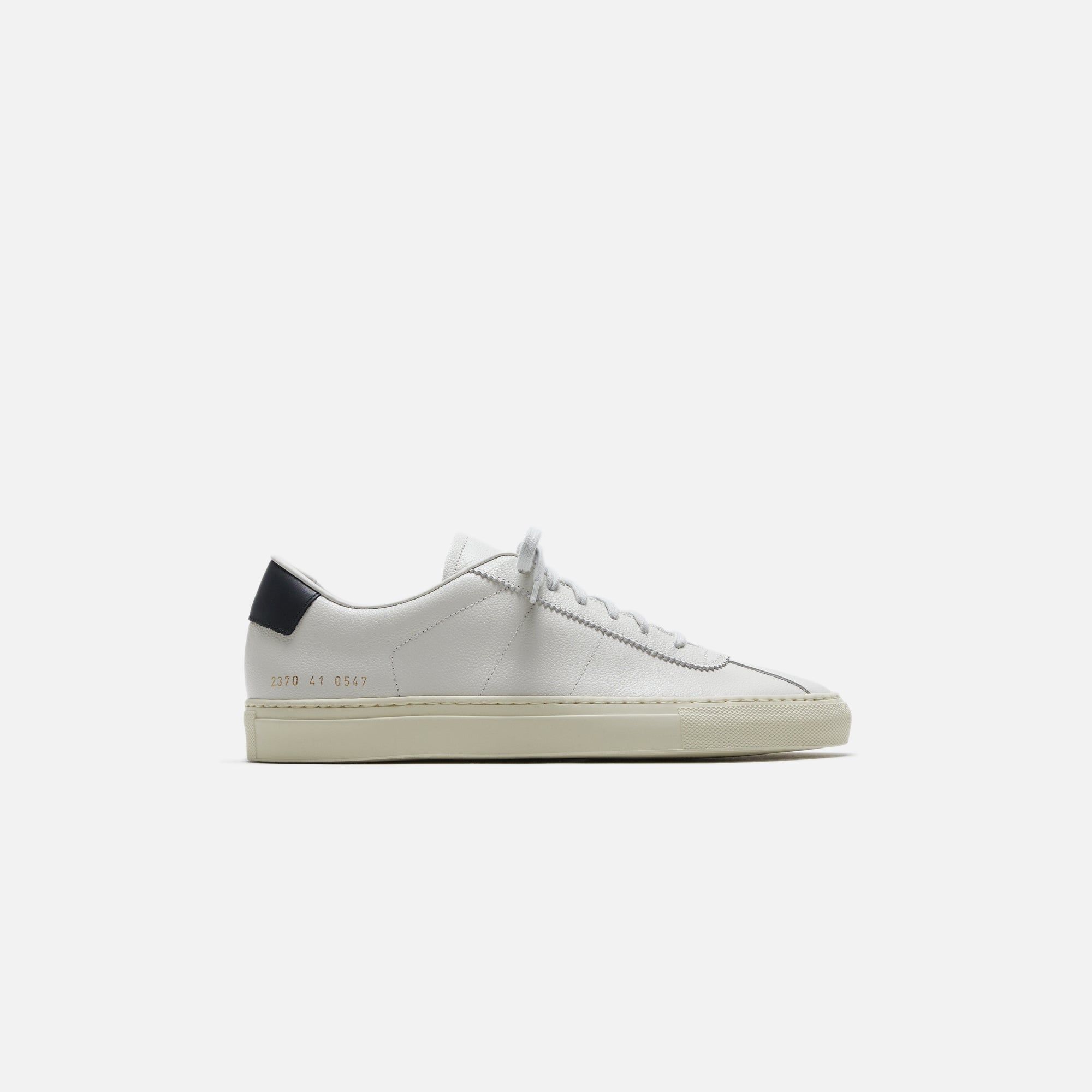 Common Projects Tennis 77 - White / Black sold by Kith