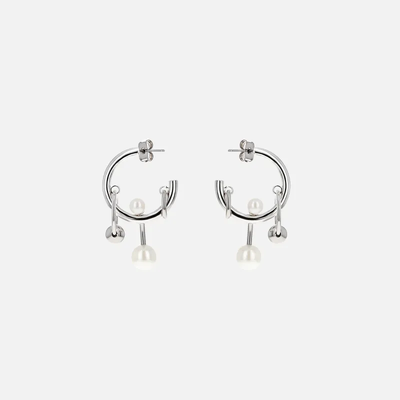 Justine Clenquet Chase Earrings - Palladium sold by Kith