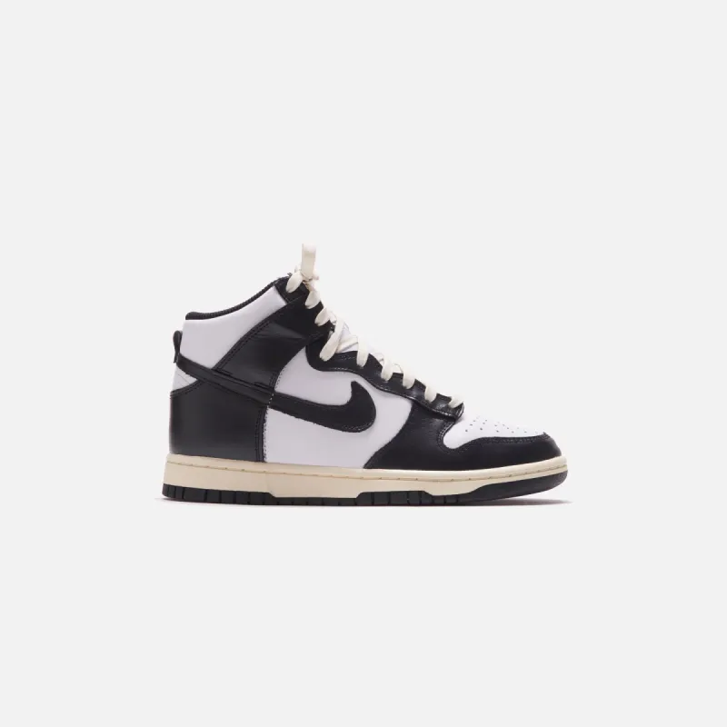 Nike WMNS Dunk High - White / Black / Coconut Milk sold by Kith