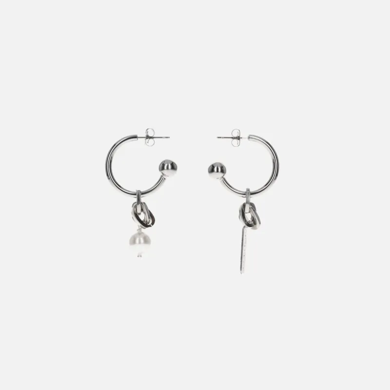 Justine Clenquet Leeloo Earrings - Palladium sold by Kith