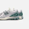 New Balance 1906R - Granite / Metallic Pink sold by Kith