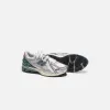 New Balance 1906R - Granite / Metallic Pink sold by Kith