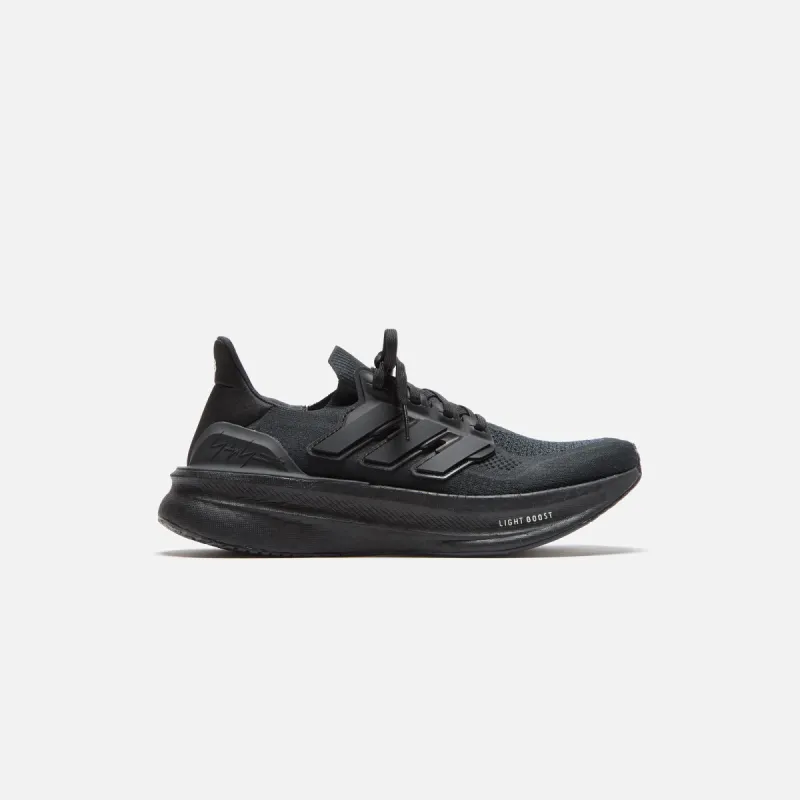 Y-3 Ultraboost 5 - Core Black / Core Black / White sold by Kith