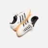 adidas x Bad Bunny Gazelle Indoor - Off-White / Black / Gum sold by Kith