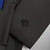 Kith for the New York Knicks Snap Front Coaches Jacket - Black sold by Kith