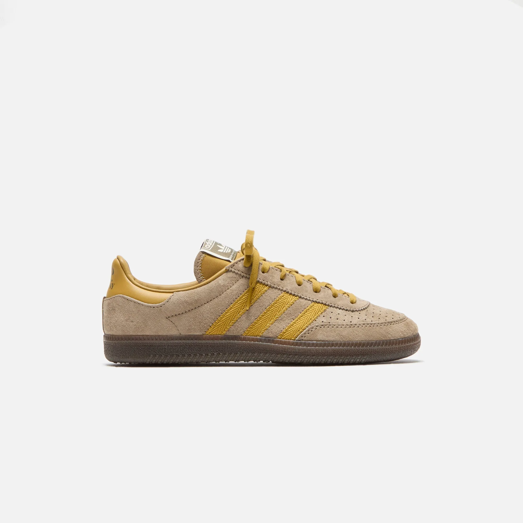 adidas x CP Company Wimberly Spzl - Tech Khaki / Preloved Bronze / Off White sold by Kith