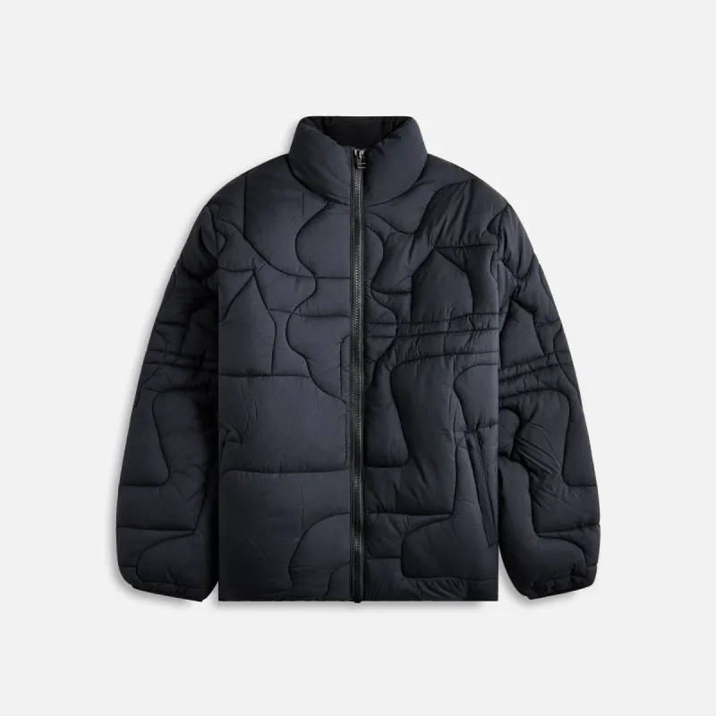 by Parra Boring Village Puffer Jacket - Black sold by Kith