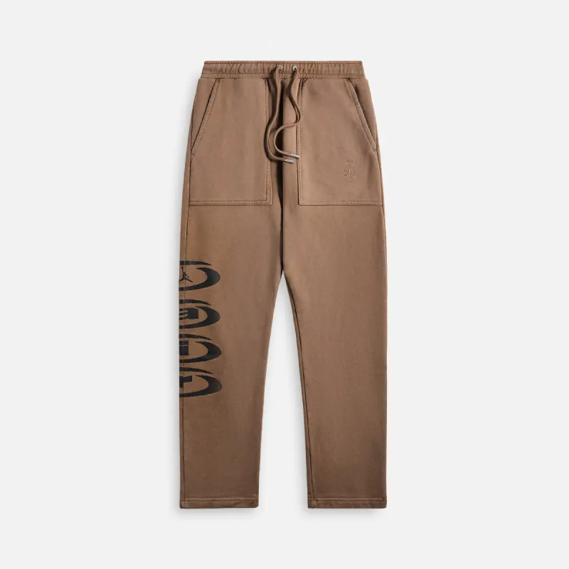 Nike Air Jordan x Travis Scott Fleece Pant - Palomino sold by Kith