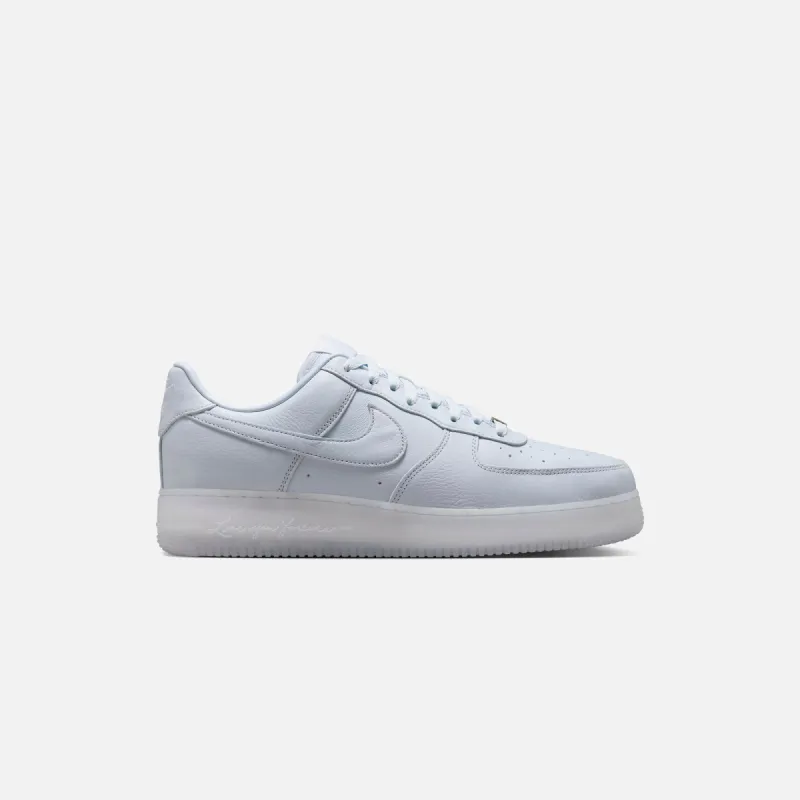 Nike x NOCTA Air Force 1 Low - Palest Purple / Cobalt Tint / Metallic Silver sold by Kith