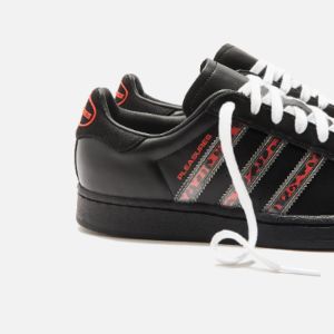 adidas x Pleasures Superstar - Core Black / Red sold by Kith