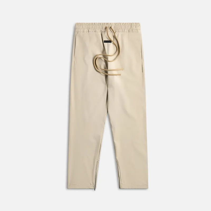 Fear of God Track Pant - Cement sold by Kith