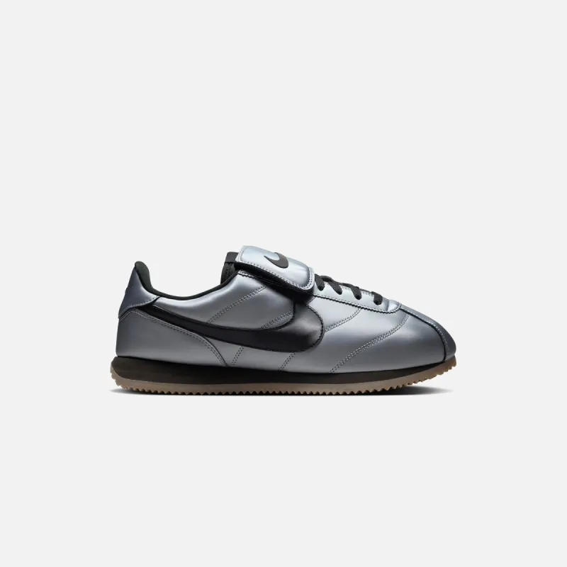 Nike Cortez Leather SE - Metallic Cool Grey / Black / Gum Dark Brown sold by Kith