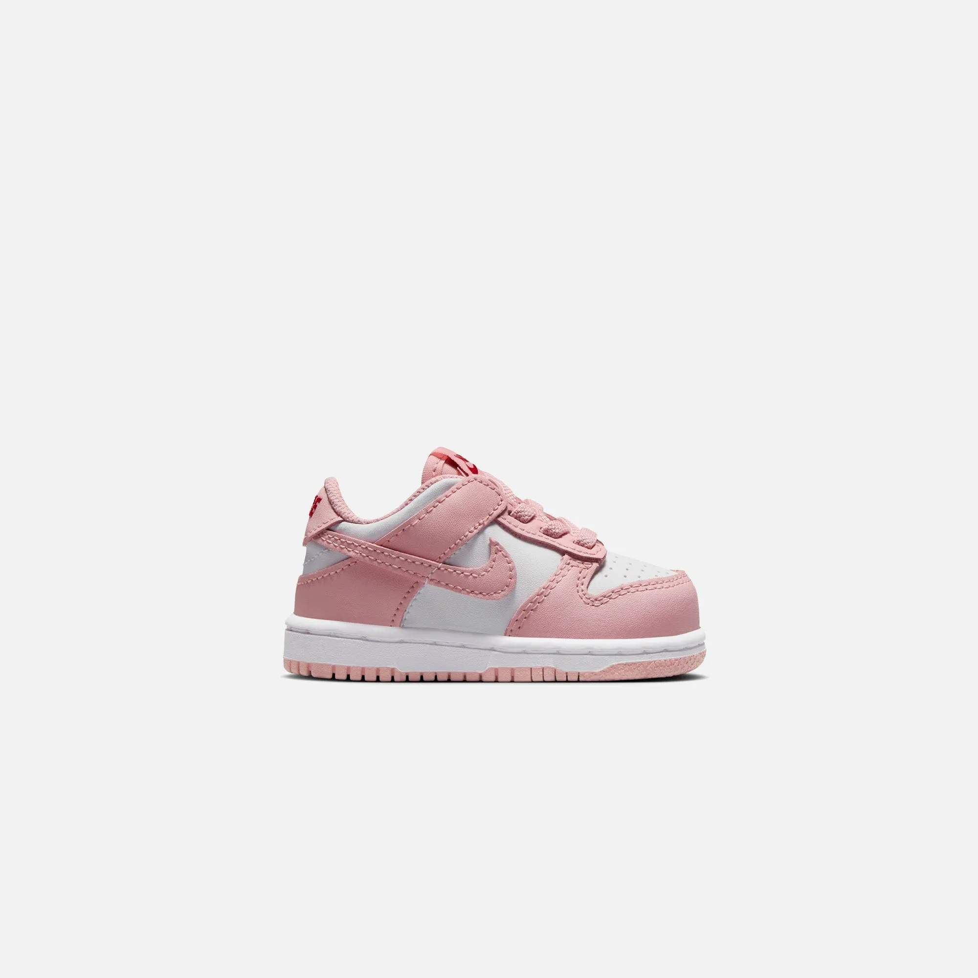 Nike TD Dunk Low - White / Pink Glaze / Pomegranate sold by Kith