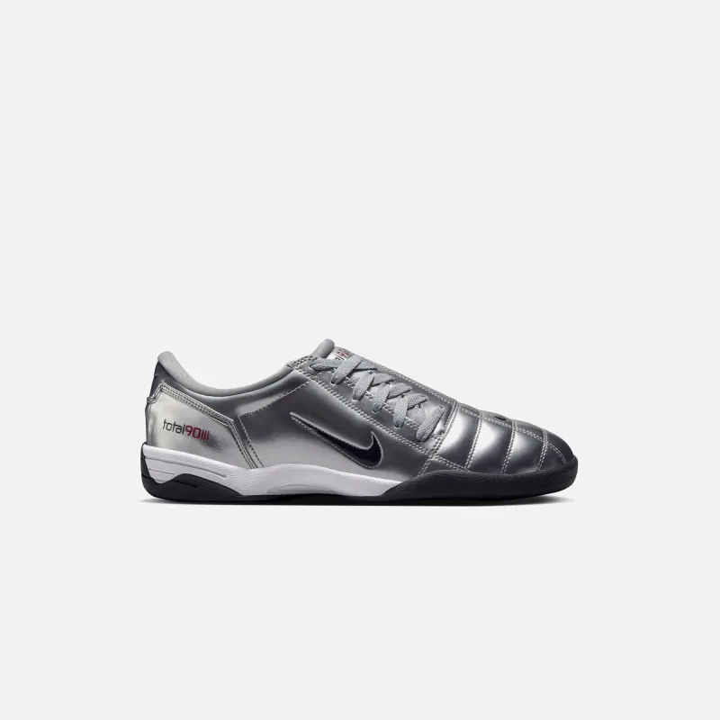 Nike Total 90 III - Metallic Silver / Black / University Red sold by Kith