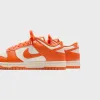 Nike Dunk Low Retro - Pale Ivory / Safety Orange sold by Kith