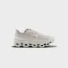 On Running WMNS Cloudmonster - Void Dew / Ivory sold by Kith