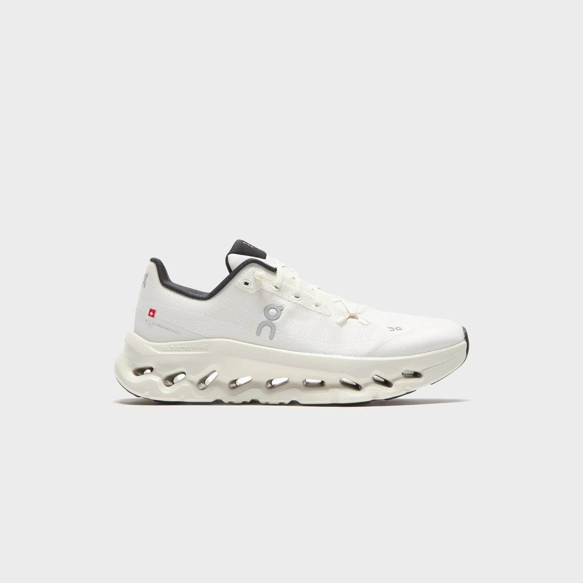 On Running WMNS Cloudtilt - Pearl / Black sold by Kith