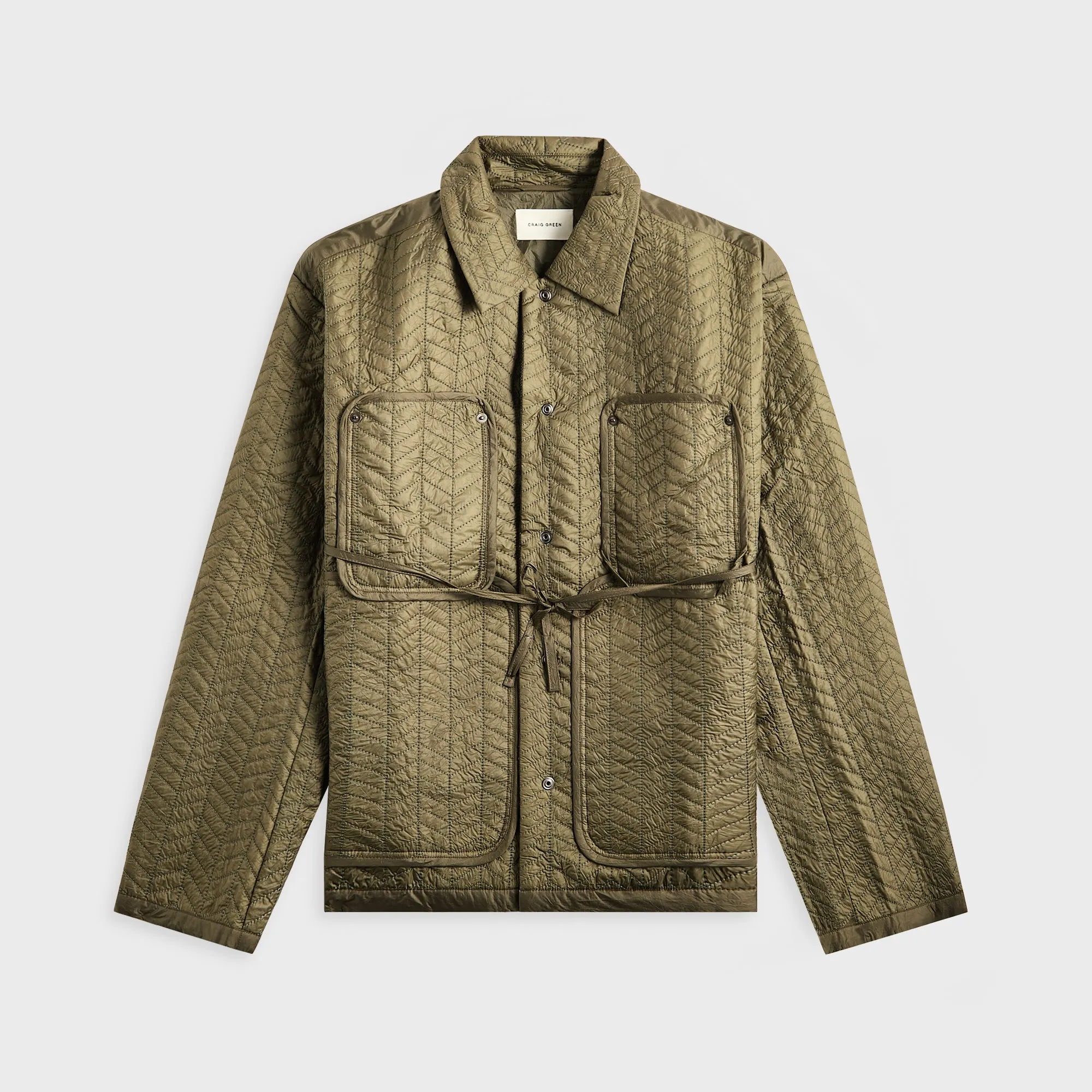Craig Green Quilted Worker Jacket - Green sold by Kith