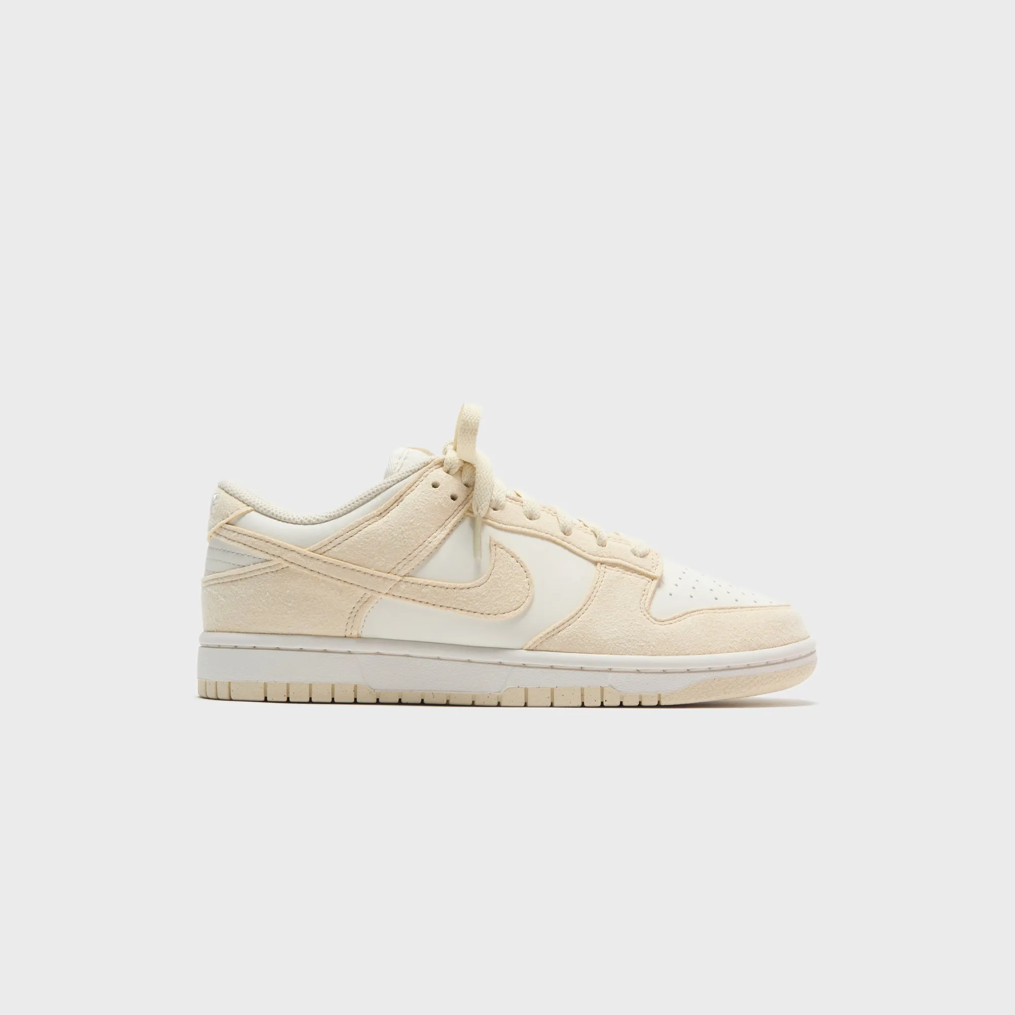 Nike WMNS Dunk Low - Soft Pearl / Beach / Pale Ivory / White sold by Kith