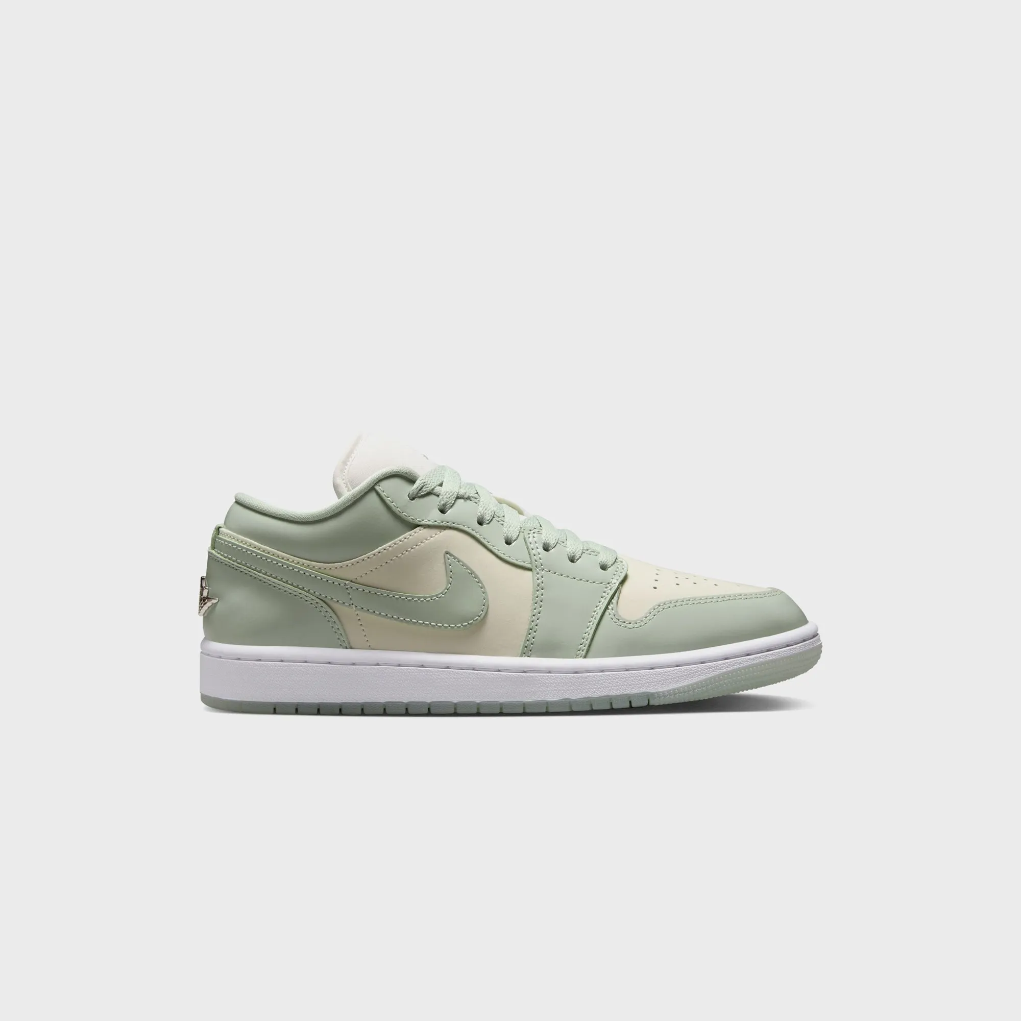 Jordan WMNS Air Jordan 1 Low SE - Sail / Seafoam / Metallic Silver / White sold by Kith