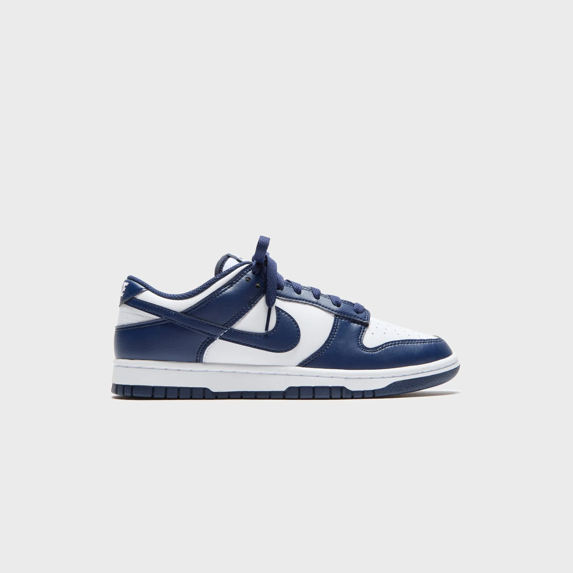 Nike Dunk Low Retro - White / Midnight Navy / White sold by Kith