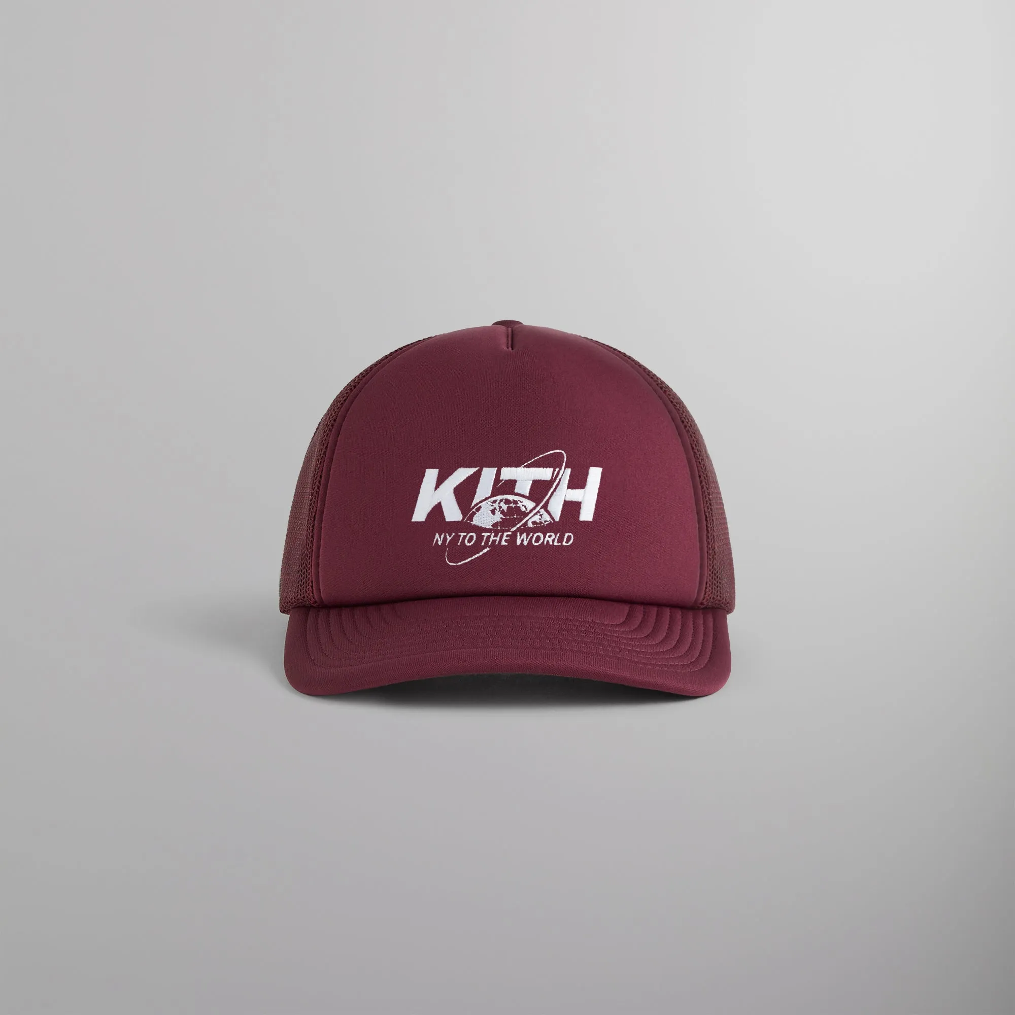 Kith NY to the World Nolan Trucker Hat - Magma sold by Kith