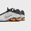 Nike Shox R4 - Black / Vast Grey / Bright Mandarin / Metallic Silver sold by Kith