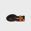 Nike Shox R4 - Black / Vast Grey / Bright Mandarin / Metallic Silver sold by Kith