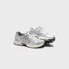 Saucony Ride Millennium - Silver / Cream sold by Kith